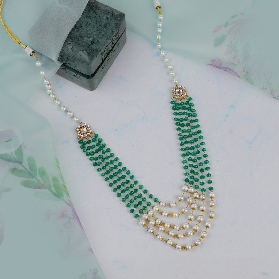 Elegant 5 Line Maala In Emeralds And Pearls Along With Flower Motives And Pearls