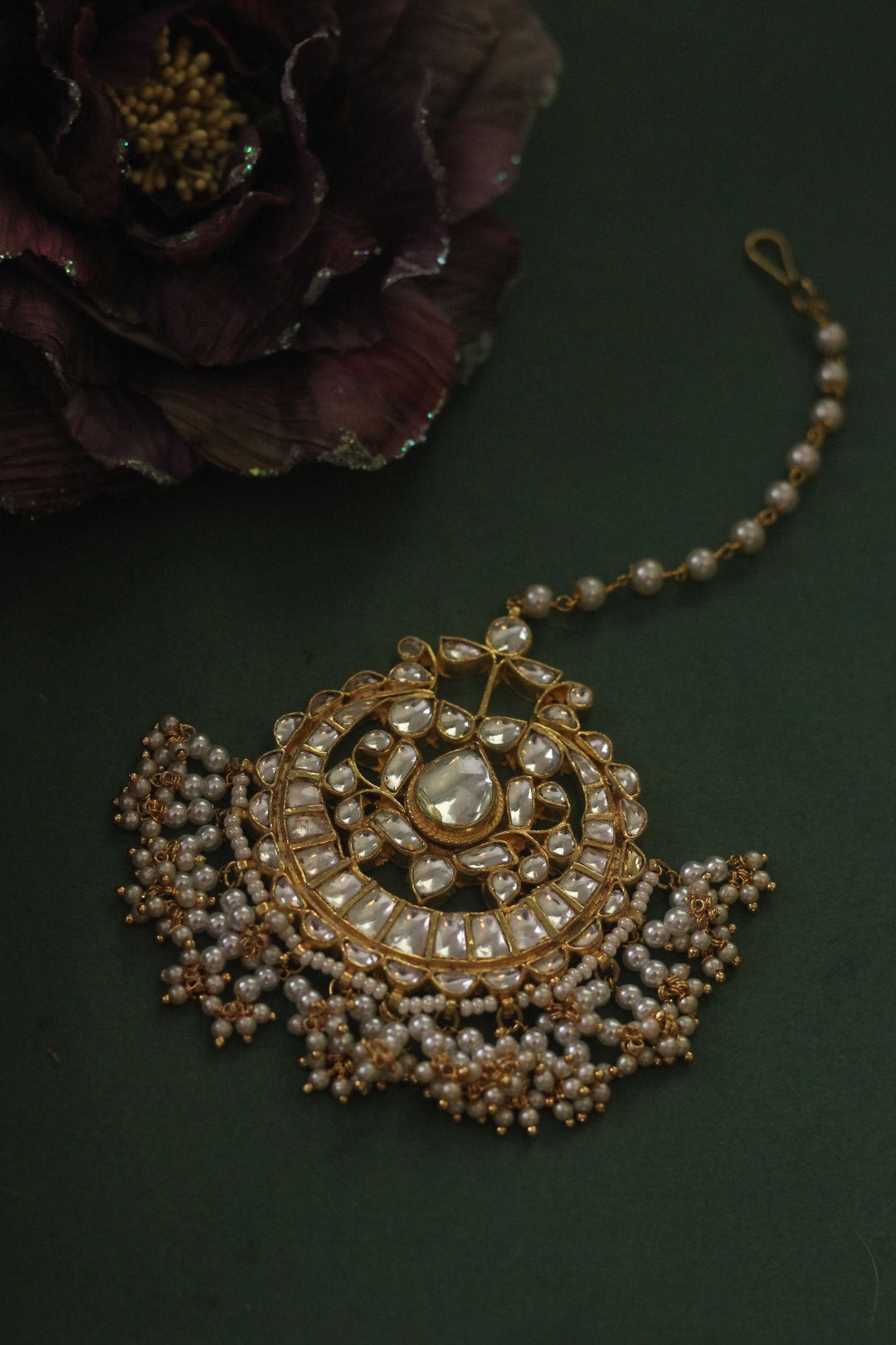 Gold plated pearl and jadtar studded maangtikka