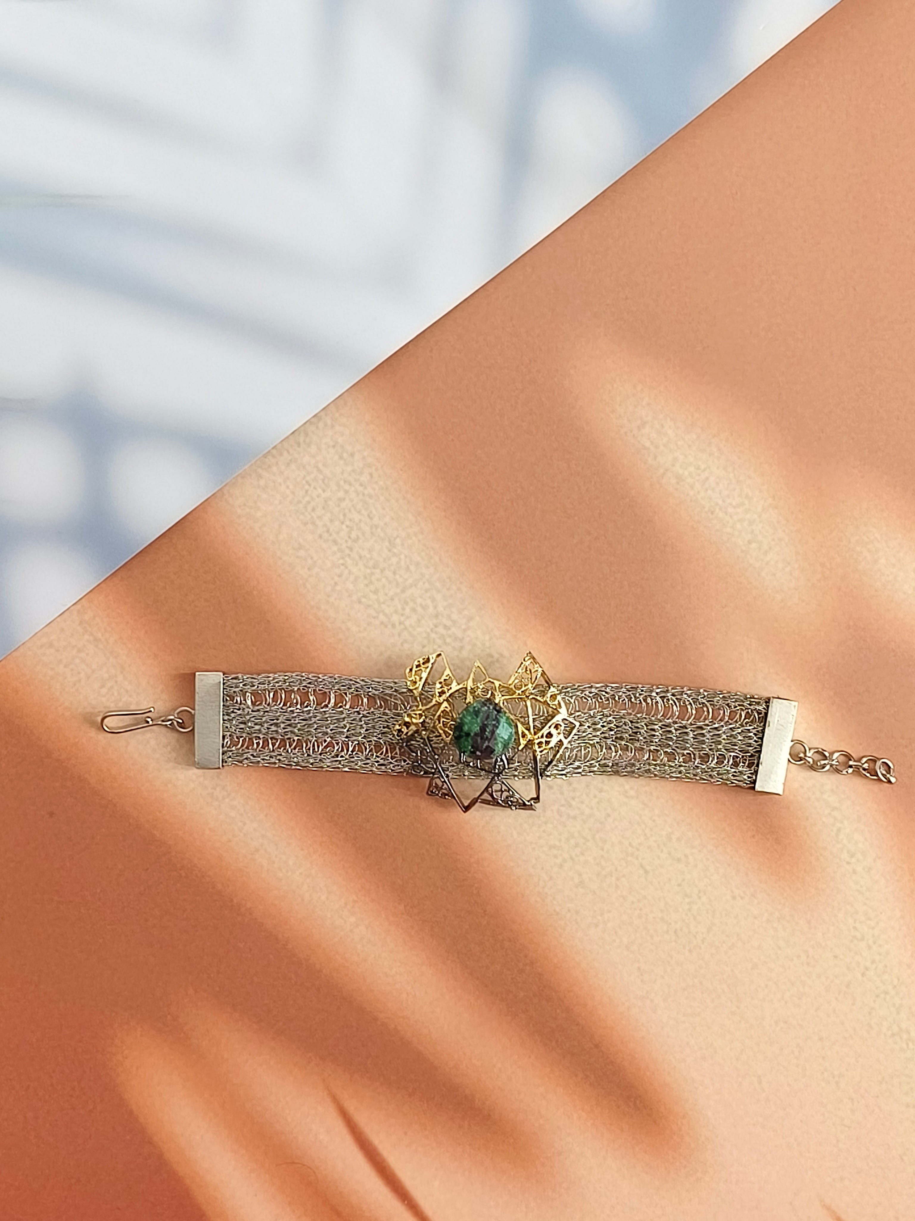 Titilating triangle bracelet