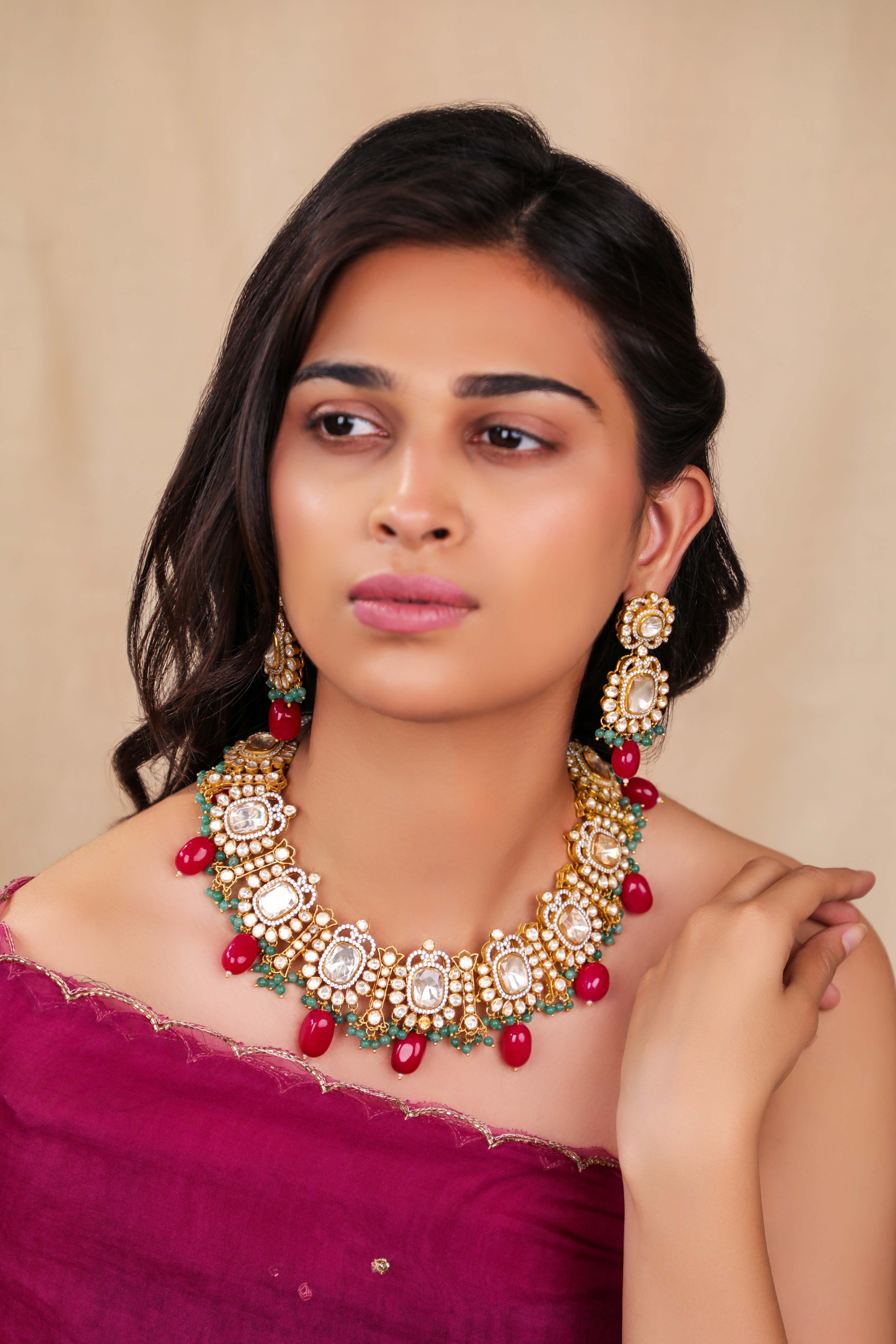 Mozonite necklace set with Ruby beads