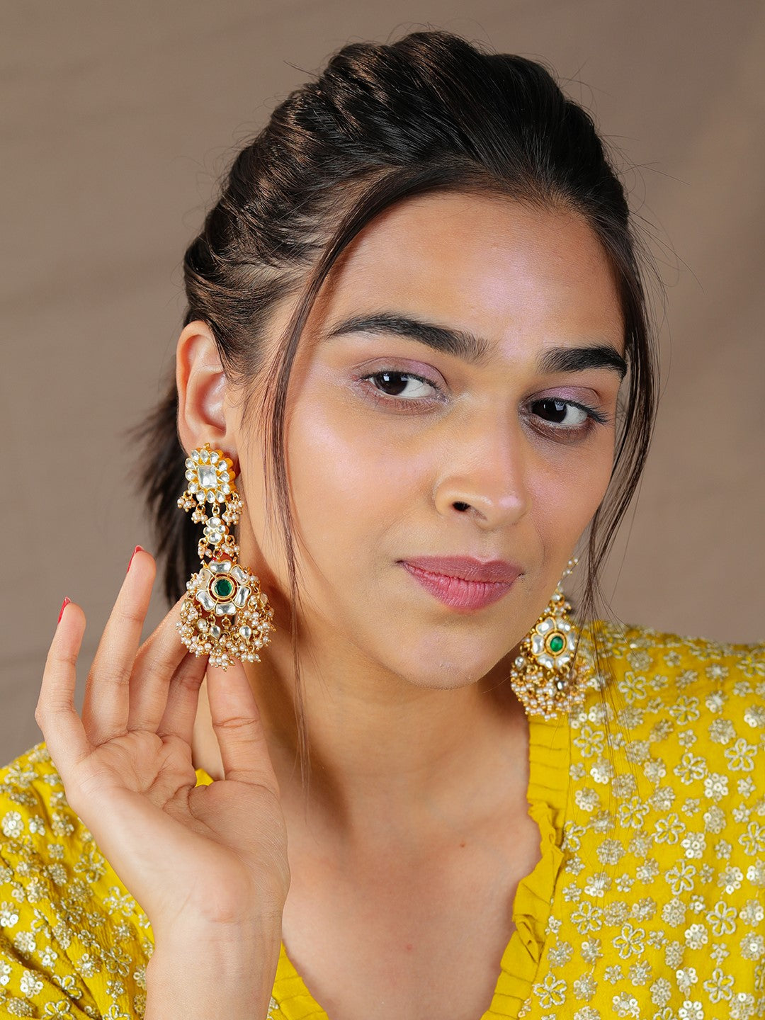 Green stone gold plated earrings