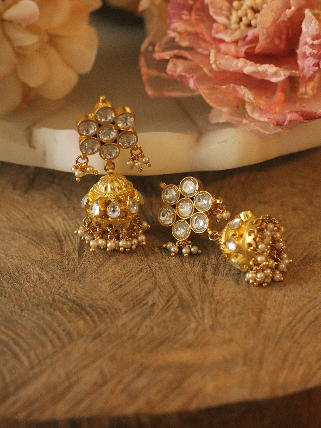 White floral studs with golden jhumki