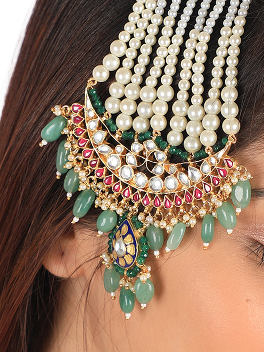 Emerald tikka coctail and bridal wear in floral desgin