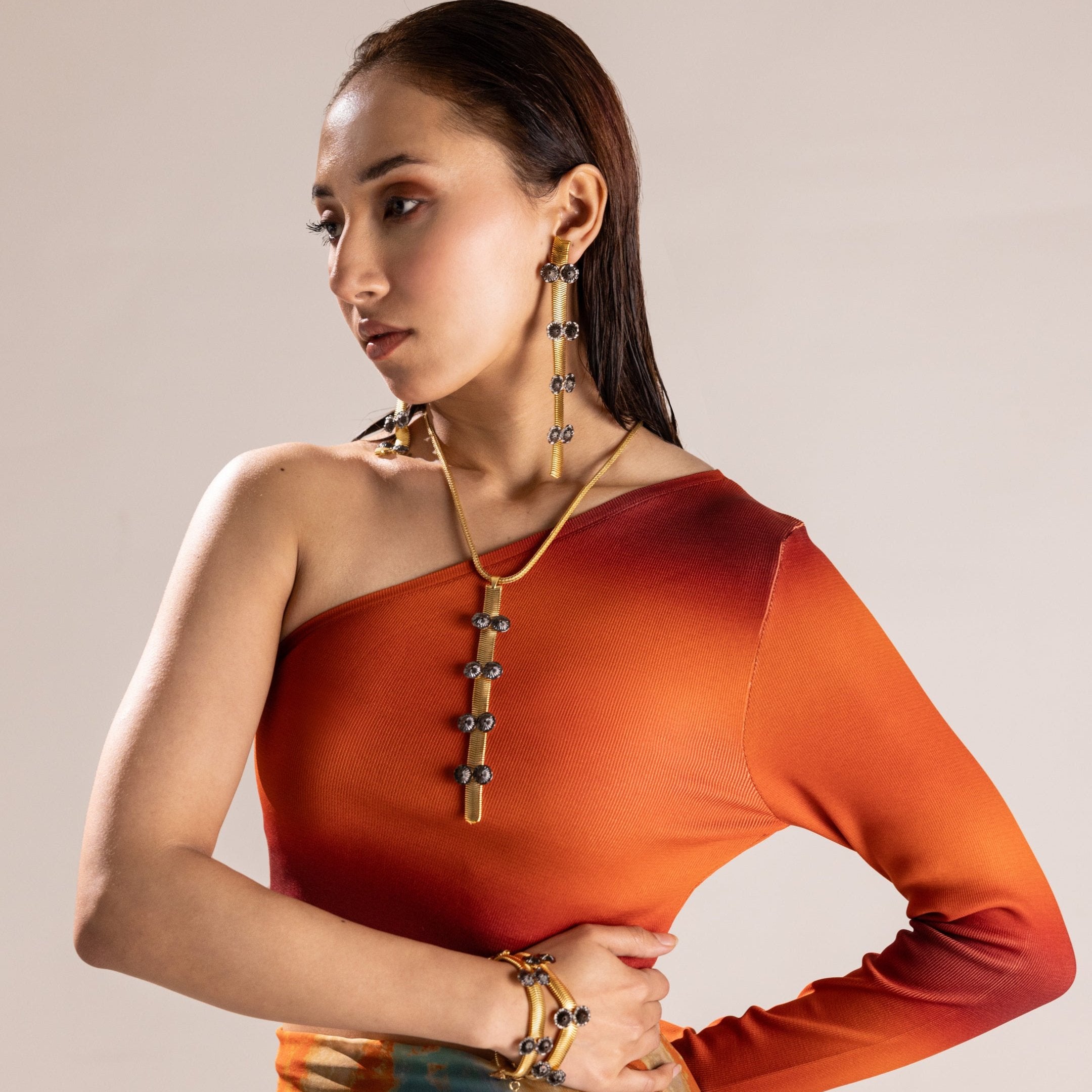 Coral gold and black earrings