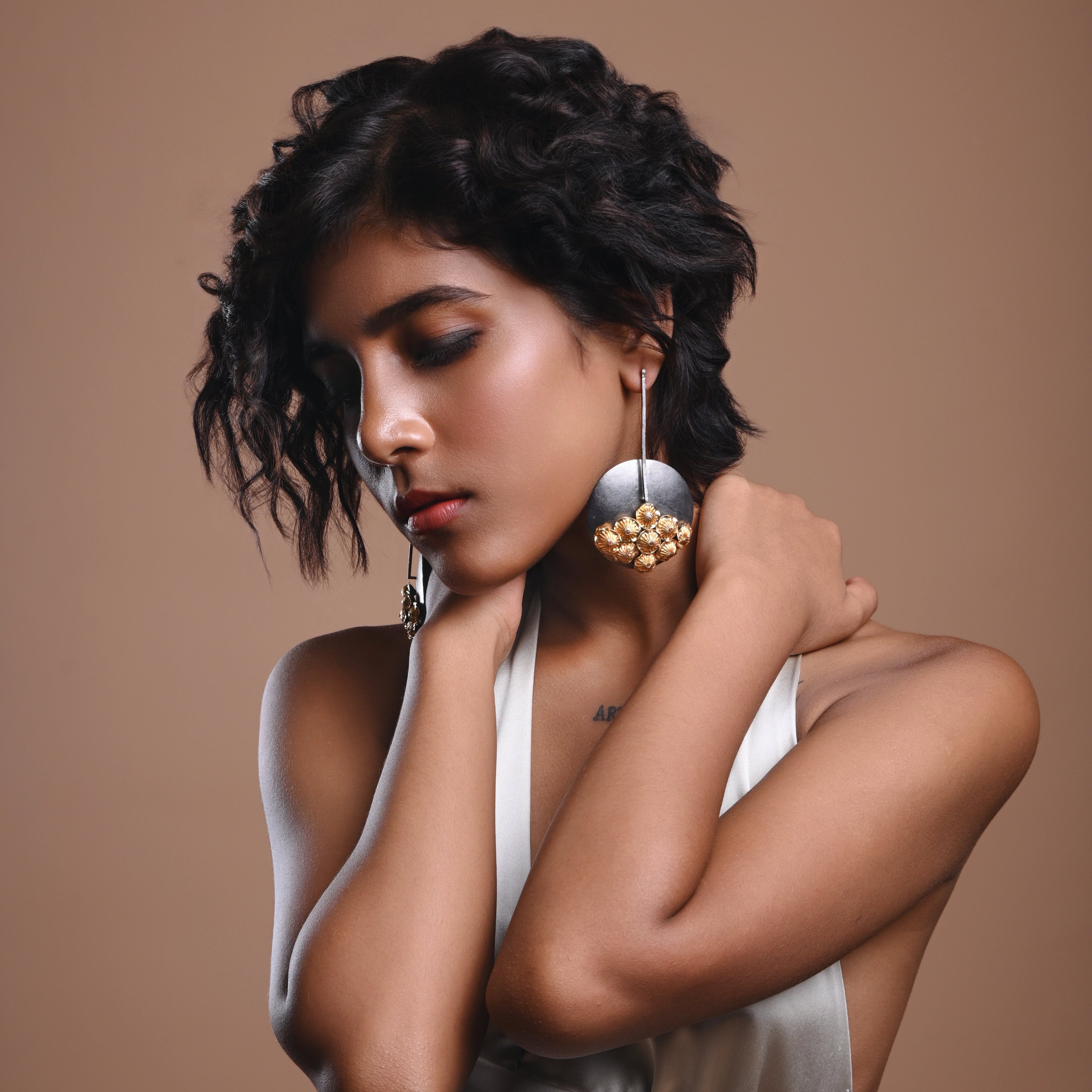 Quirky gold earrings