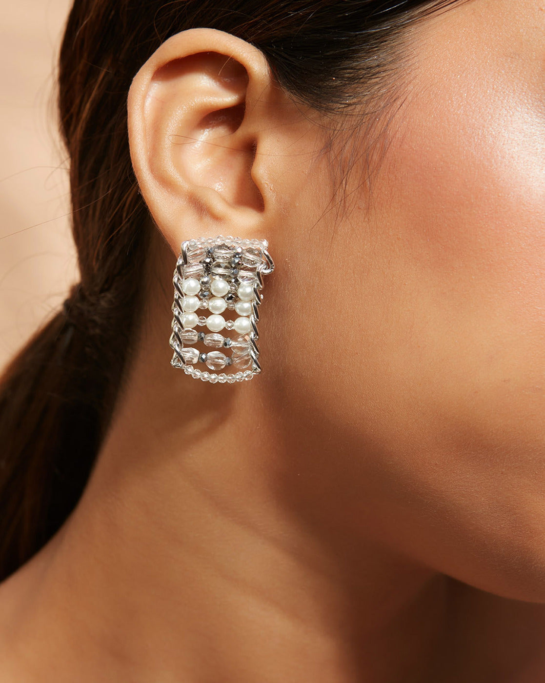 Metallic silver studs with pearls and crystals