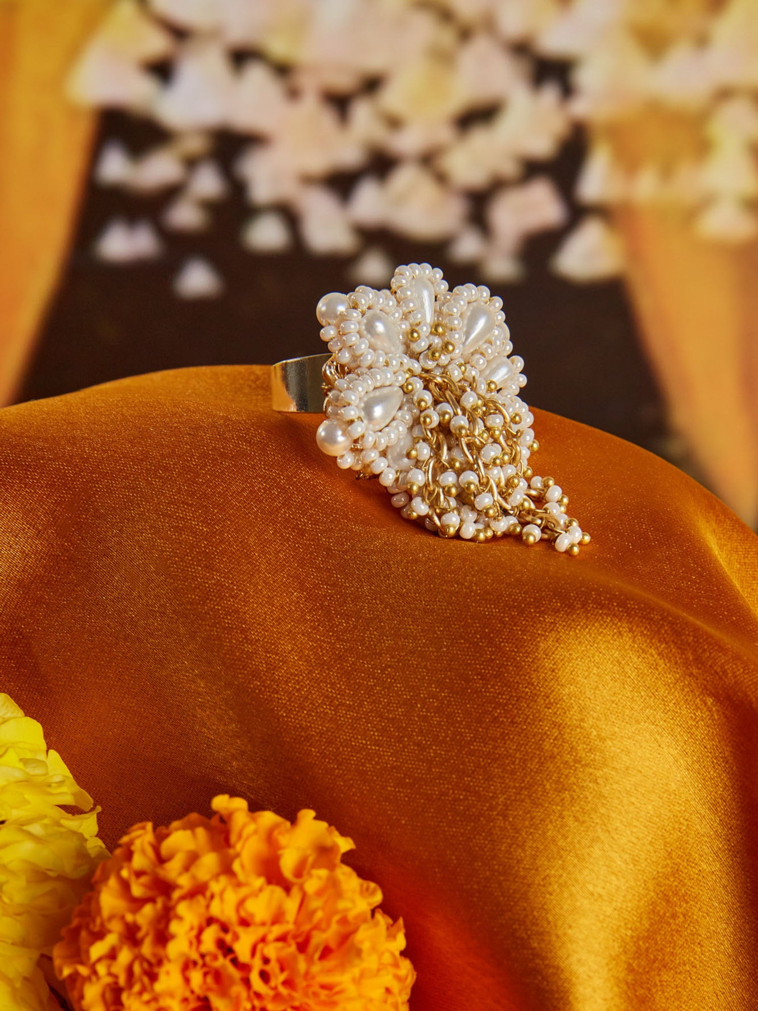 Designer white pearls and golden hoops finger ring