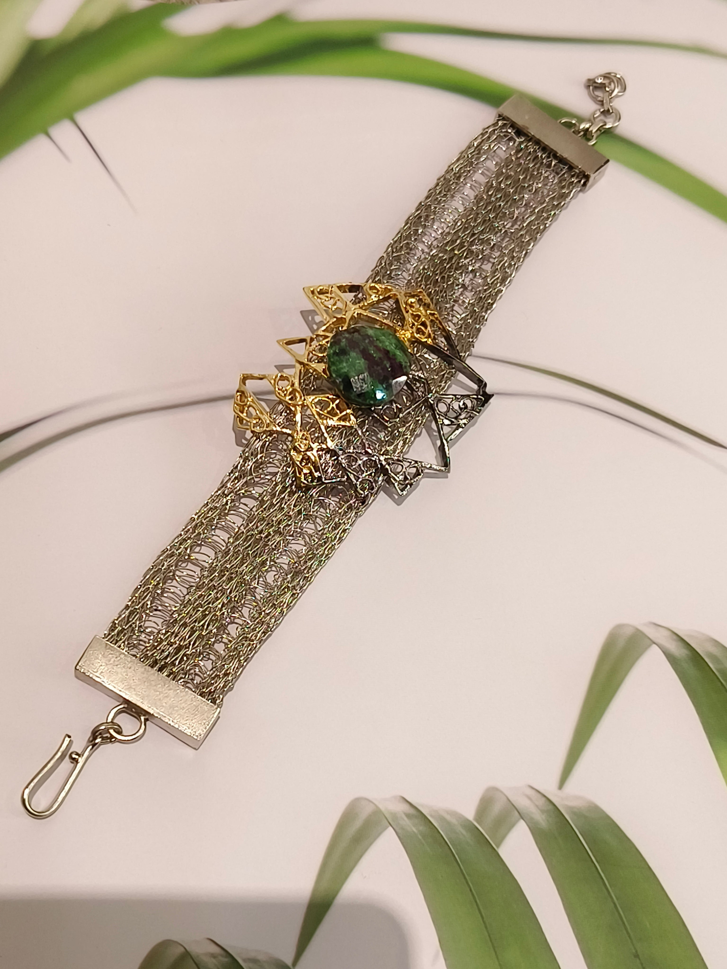 Titilating triangle bracelet