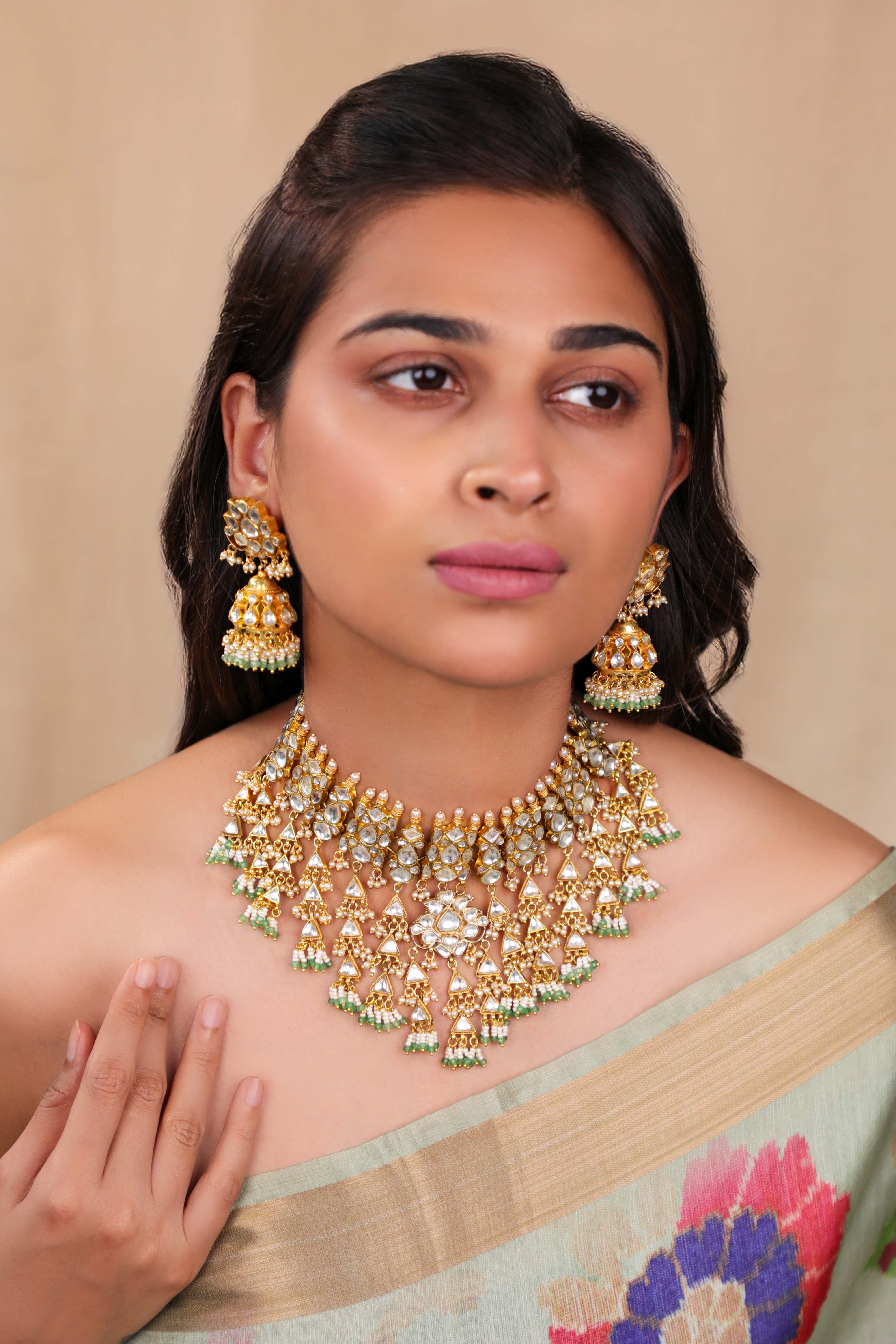 Jadtar kundan set with jhumkis