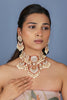 Handcrafted choker necklace with a little touch of pink.