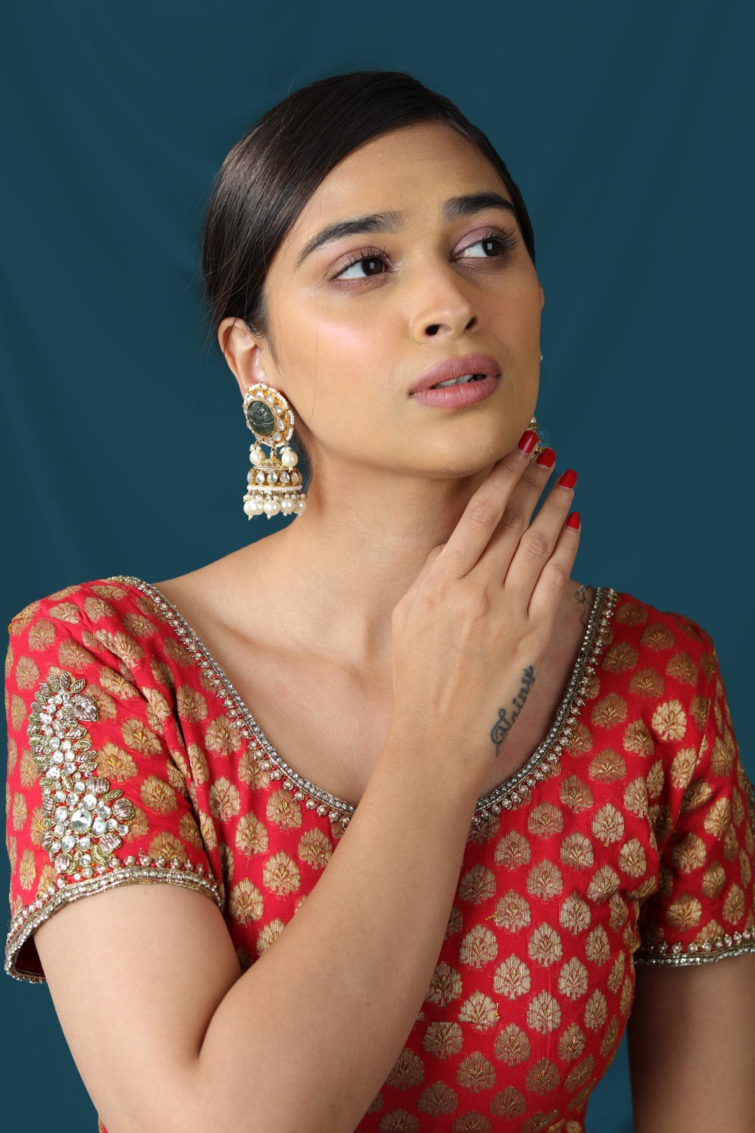 Green white jhumka with handcrafted semi precious gem stones