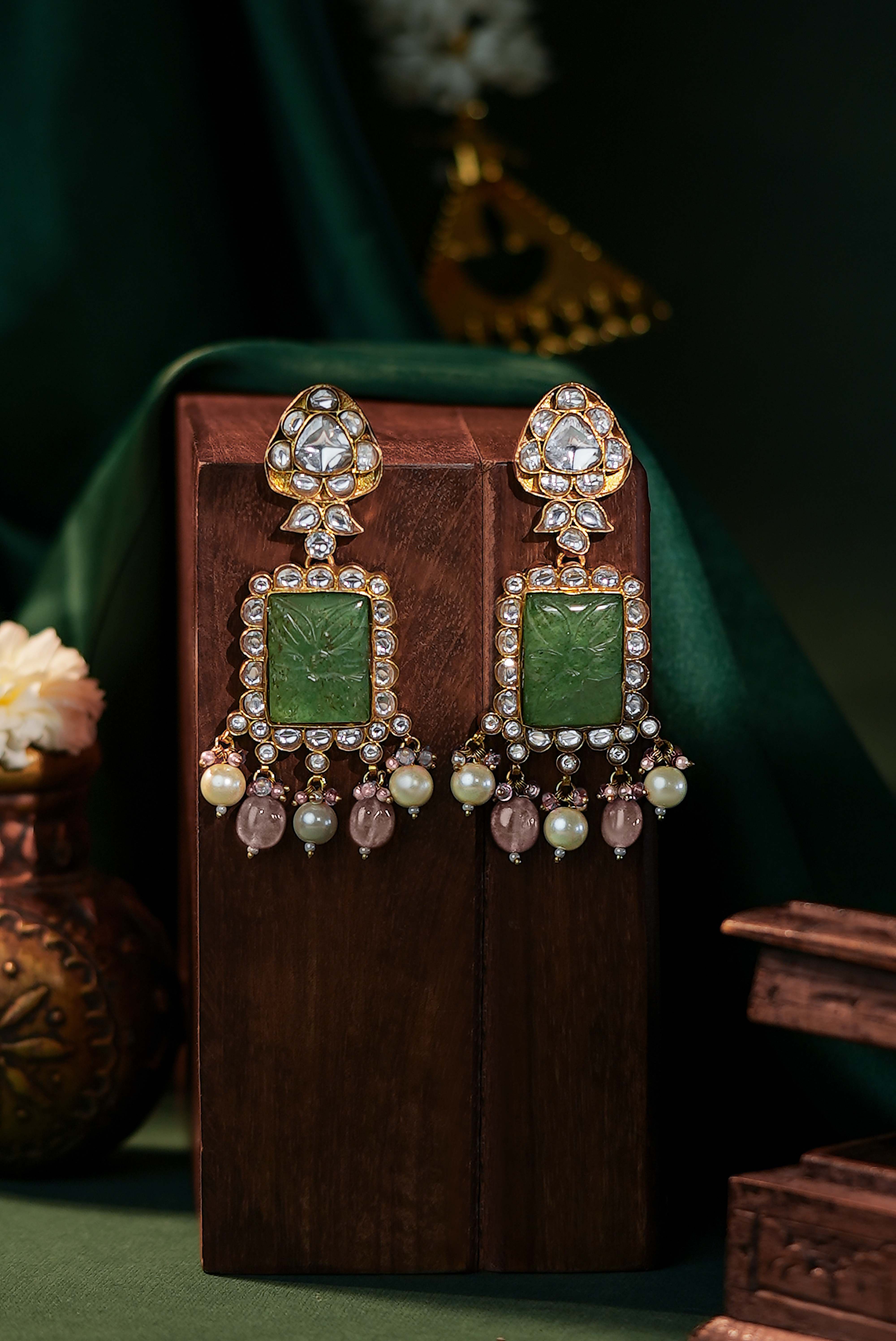 Handcrafted earings with carved stone
