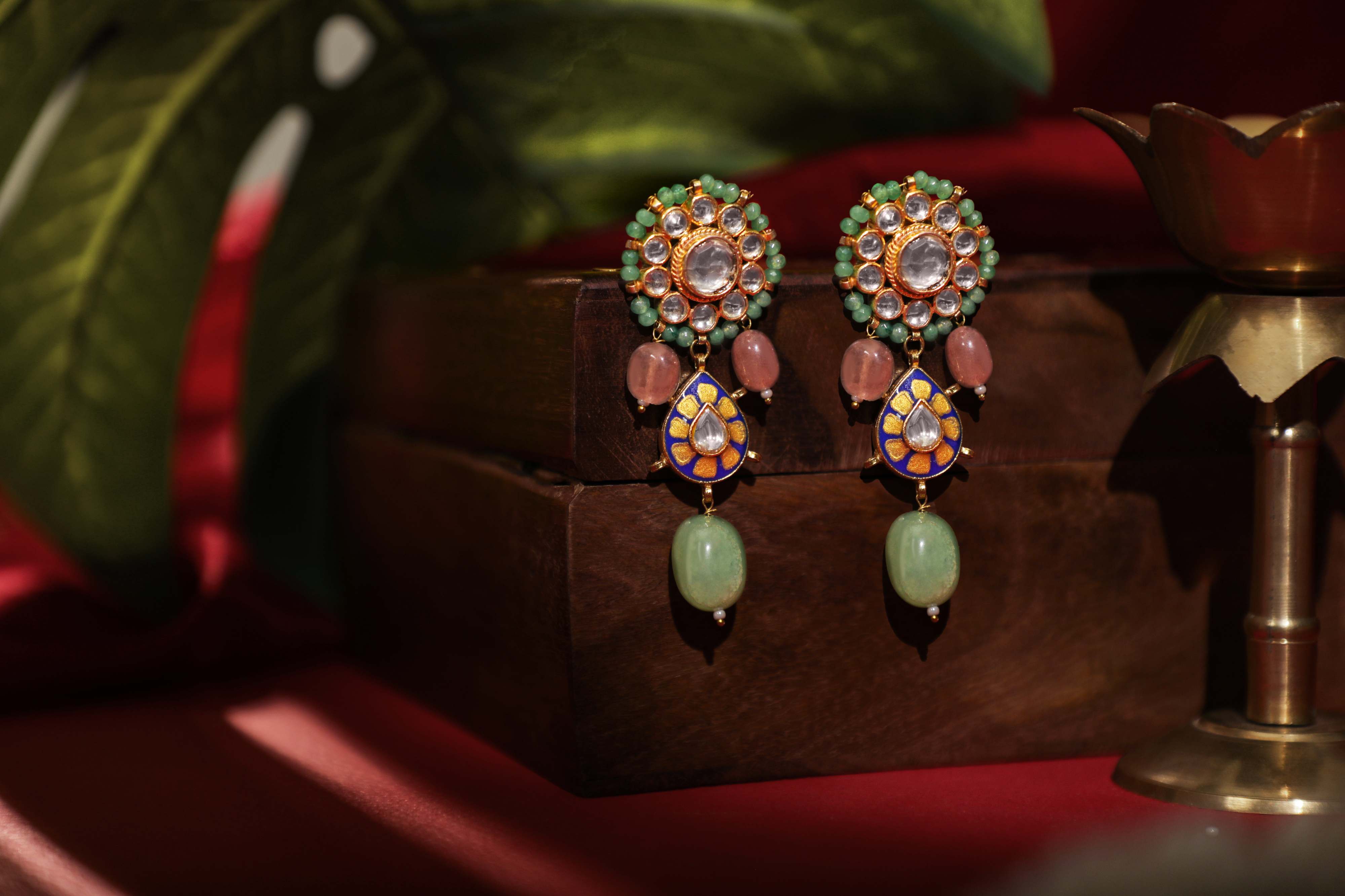 Delicate stud earings with pastel drops