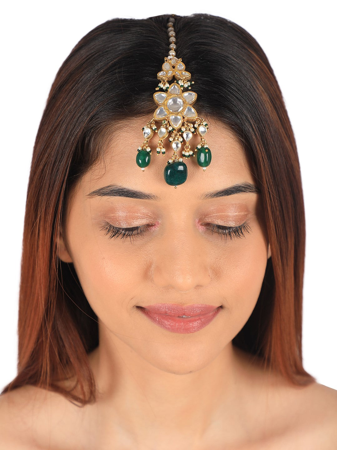 Emerald tikka coctail and bridal wear in floral desgin