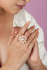 Gold plated ring floral design with uncut moissanite stones
