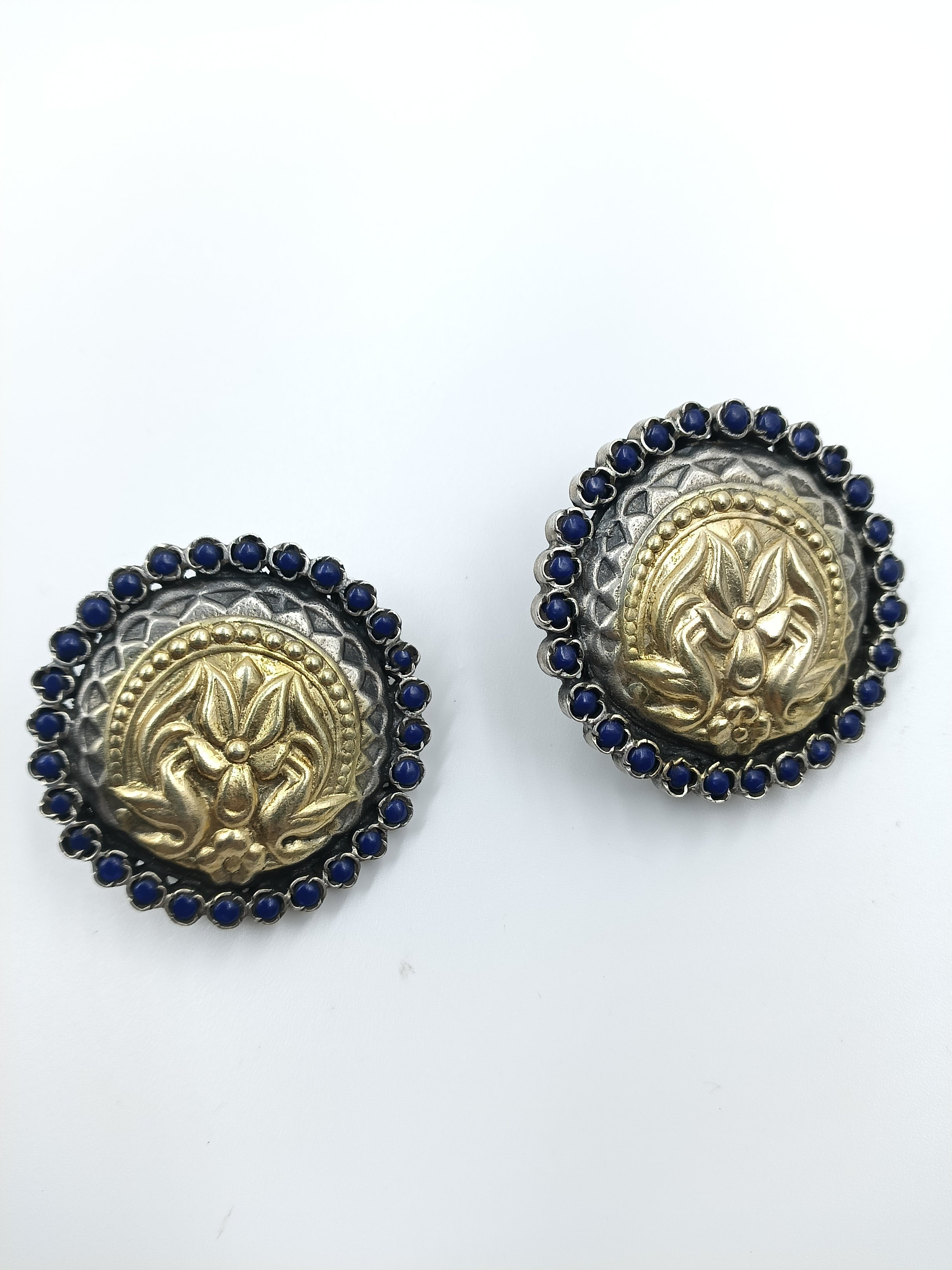 Coin Motif Stud Earrings with Blue Stone Border